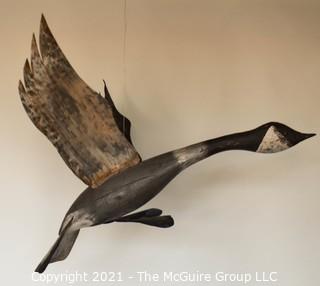 Primitive Hanging Painted Metal Folkart Sculpture of a Canadian Goose.  Wingspan measures 36"L. 