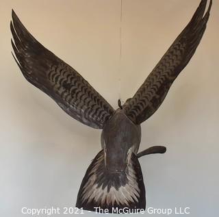 Primitive Hanging Painted Metal Folkart Sculpture of a Canadian Goose.  Wingspan measures 36"L. 