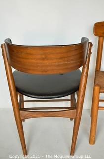 Two (2) Mid Century Modern MCM Dining or Desk Chairs.  One with black vinyl upholstery (burn hole), One with rush seating. 