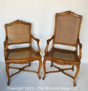 Two (2) French Provincial Style Cane Seat Arm Chairs with Carved Back and Arms. 