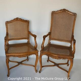 Two (2) French Provincial Style Cane Seat Arm Chairs with Carved Back and Arms. 