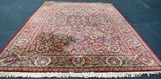 Machine Woven Oriental Rug with Red Ground, Made in Belgium.  Measures 104"L X 96"W.