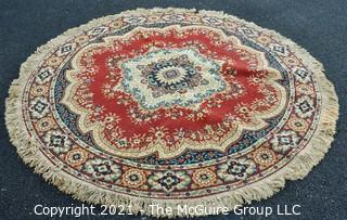 Machine Made Center Hall Round Rug with Red Ground.  Measures 70"D.