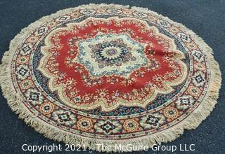 Machine Made Center Hall Round Rug with Red Ground.  Measures 70"D.