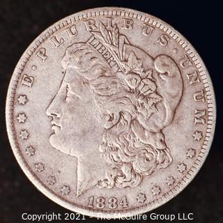  Numismatic: Morgan Silver Dollar 1884-O