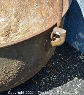 Large Tri-footed Cast Iron Cauldron with Handle.  Drain slot in Base.  Measures 24"D x 14"H.