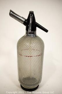 Vintage Mid Century Modern Soda Syphon.  Glass with Metal Mesh Overlay.  Barware. 