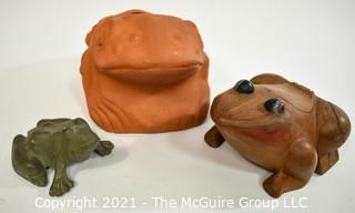 Three (3) Garden Frogs.  Includes Wooden Decorative Box, Iron Door Stop and Ceramic Planter.   Ribbet Ribbet