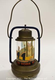 Vintage Art Deco 1939 New York World's Fair Brass Battery Lantern. Measures 8"T.