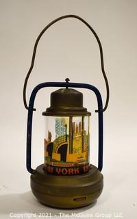 Vintage Art Deco 1939 New York World's Fair Brass Battery Lantern. Measures 8"T.