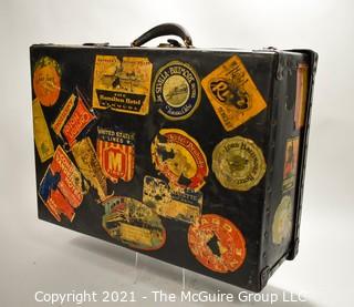 Vintage Fiberglass Drum Case Covered in International Luggage Travel Labels and Tags.  Measures 9" D x 17"W x  24"L.