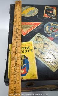 Vintage Fiberglass Drum Case Covered in International Luggage Travel Labels and Tags.  Measures 9" D x 17"W x  24"L.