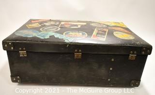 Vintage Fiberglass Drum Case Covered in International Luggage Travel Labels and Tags.  Measures 9" D x 17"W x  24"L.