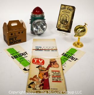 Group of Eclectic Items Including Lantern, Pet Rock, Match Case, Globe Shaped Table Lighter, Fall Out Shelter Brochures and TV Guide. 