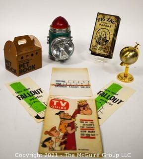 Group of Eclectic Items Including Lantern, Pet Rock, Match Case, Globe Shaped Table Lighter, Fall Out Shelter Brochures and TV Guide. 