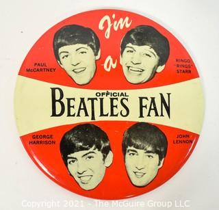 Vintage Authentic 1964 "I'm a Official Beatles Fan" Pin made by NEMS Enterprises LTD .  Measures 4" in diameter. 