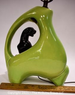 Mid Century Modern Pottery Chartreuse Green Black Panther TV Table Lamp.  Measures 23"T.