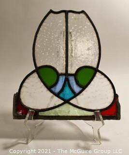 Group of Glass Items Including Stained Glass, Blue Glass Divided Candy Dish with Chrome Cover and Pink Iridescent Globe Piggy Bank.