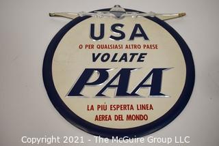 Vintage Pan Am Airlines (PAA) Round Card Board with Silver Detail Gate Sign in Italian. Reads "USA Or To Any Other Country PAA To Fly The Most Experienced Airline In The World".  Measures 11"D.