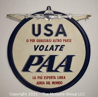 Vintage Pan Am Airlines (PAA) Round Card Board with Silver Detail Gate Sign in Italian. Reads "USA Or To Any Other Country PAA To Fly The Most Experienced Airline In The World".  Measures 11"D.