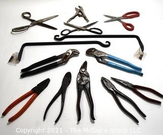 Hand Tools: Grouping includes pliers and two wall mounting brackets