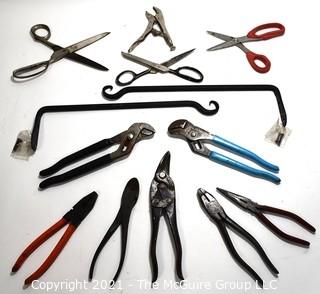 Hand Tools: Grouping includes pliers and two wall mounting brackets