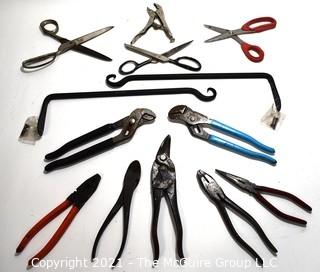 Hand Tools: Grouping includes pliers and two wall mounting brackets