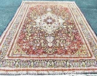 Vintage Hand Knotted Wool Rug with Center Medallion and Border Pattern on Blue Background.  Measures 105" x 71"  