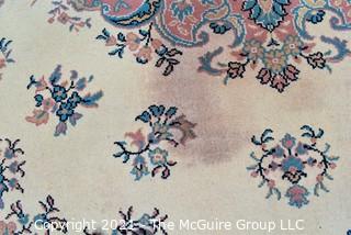 Vintage Wool Rug with Blue Medallion on White Ground.  Has been cleaned, but some discoloraton.  Measures 124" x 94". 
 Measures 124" x 94".