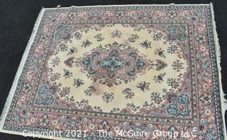 Vintage Wool Rug with Blue Medallion on White Ground.  Has been cleaned, but some discoloraton.  Measures 124" x 94". 
 Measures 124" x 94".