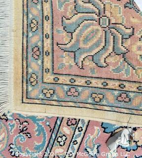Vintage Wool Rug with Blue Medallion on White Ground.  Has been cleaned, but some discoloraton.  Measures 124" x 94". 
 Measures 124" x 94".