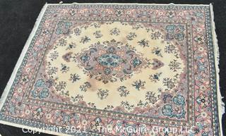 Vintage Wool Rug with Blue Medallion on White Ground.  Has been cleaned, but some discoloraton.  Measures 124" x 94". 
 Measures 124" x 94".