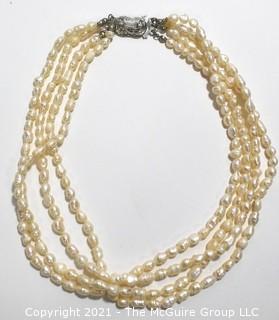 Vintage Four (4) Strand Fresh Water Pearl Necklace with Rhinestone Clasp.
