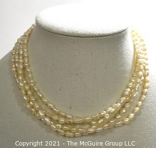 Vintage Four (4) Strand Fresh Water Pearl Necklace with Rhinestone Clasp.
