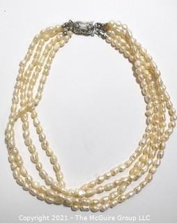 Vintage Four (4) Strand Fresh Water Pearl Necklace with Rhinestone Clasp.
