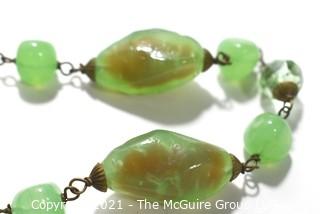 Opera Length Vintage Green Art Glass Bead Necklace. Measures 44"L