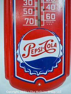 Vintage Original Red Metal Pepsi Cola Thermometer Advertising Sign, circa 1943. Measures 26"T x 9"W.