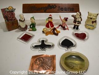 Eclectic Group Including Carved Wood Wrangler Jeans Advertising Counter Top Sign, Porcelain Christmas Elf Figurines, Copper Bas-relief of Native American, Set of Four (4) Bridge Glass Ashtrays & 1940's Puss'n Boots Creamer.