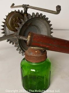 Collection of Vintage Garden and Yard Items.  Includes Tractor Wheel, Three (3) Grass Water Sprinklers and Bug Sprayer with Green Glass Container. 