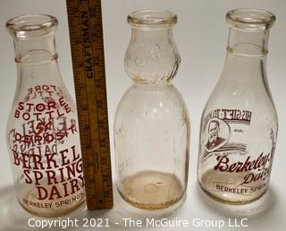 Three (3) Vintage Milk Bottles from Berkley Springs, West Virginia.  One with "The Whip".