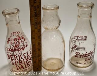 Three (3) Vintage Milk Bottles from Berkley Springs, West Virginia.  One with "The Whip".