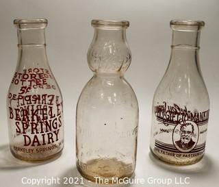 Three (3) Vintage Milk Bottles from Berkley Springs, West Virginia.  One with "The Whip".