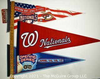 Three (3) Washington Nationals Baseball Felt Pennants Celebrating Return to RFK Stadium.  One with stitched Logo. 