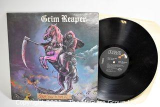 Lot of 4 LP Vinyl Records Hard Rock Titles by Dokken, Cinderella, Judas Priest, and Grim Reaper