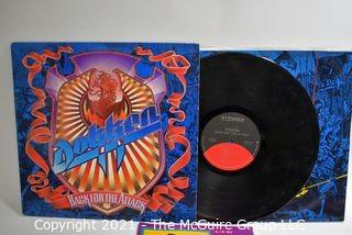 Lot of 4 LP Vinyl Records Hard Rock Titles by Dokken, Cinderella, Judas Priest, and Grim Reaper