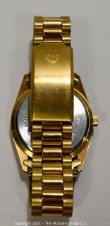 Men's Jules Jurgensen Presidential Day & Date Quartz Watch in Gold Tone Case and Band.