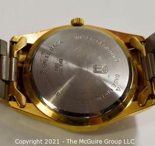 Men's Jules Jurgensen Presidential Day & Date Quartz Watch in Gold Tone Case and Band.