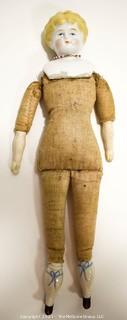 Antique Doll: Ceramic Head Forearms and Feet on Cloth Body (sawdust)