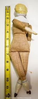 Antique Doll: Ceramic Head Forearms and Feet on Cloth Body (sawdust)