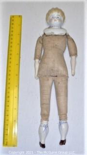 Antique Doll: Ceramic Head Forearms and Feet on Cloth Body (sawdust)